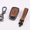 Чехол брелок для ключа Chevrolet коричневый 4 кнопки тип А Чехол брелок для ключа Chevrolet коричневый 4 кнопки тип А